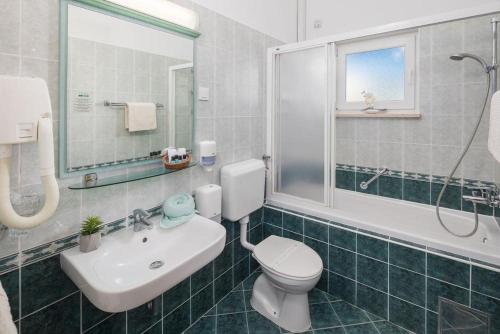 Koupelna v ubytování Apartments Materada Residence
