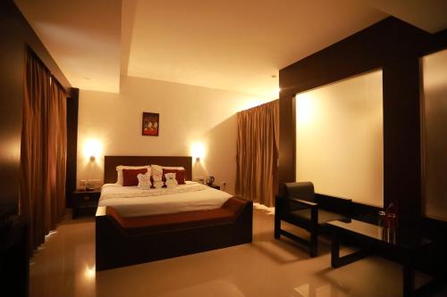 Ένα ή περισσότερα κρεβάτια σε δωμάτιο στο Hotel Finch