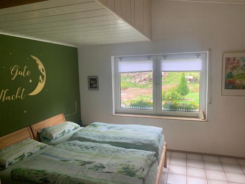 Un pat sau paturi într-o cameră la Zur Clemens Hütte