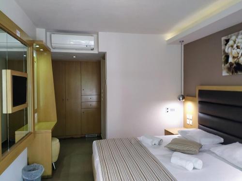 Cama o camas de una habitación en Pantheon Hotel