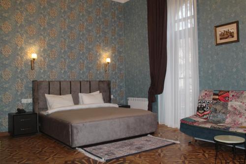 Postel nebo postele na pokoji v ubytování Hotel 1883