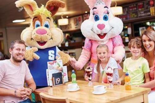 a group of people posing for a picture with mascots at Modern 6 Berth Static Caravan, Hunstanton in Hunstanton