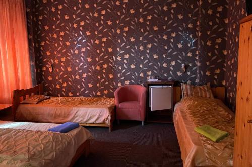 Letto o letti in una camera di Airport Szálló