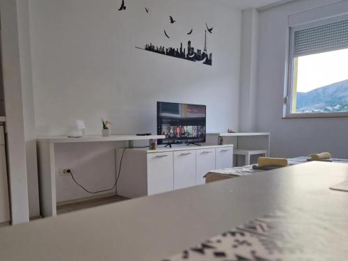 Η κουζίνα ή μικρή κουζίνα στο Candy apartments