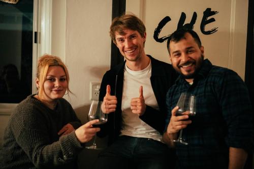 a group of three people holding thumbs up at Chepatagonia Hostel & Experiences in Puerto Madryn