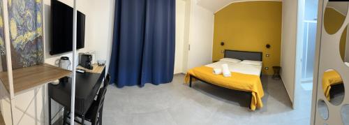 Ein Bett oder Betten in einem Zimmer der Unterkunft B&B SOUL Messina