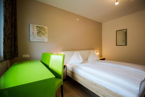 Кровать или кровати в номере Klamberghof Burgstaller