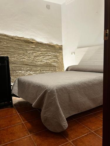 Un pat sau paturi într-o cameră la Apartamento ¨El lizón¨
