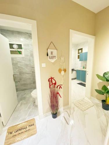a bathroom with a shower and a toilet at Smart Entry Apartment w Pvt Entrance 3B in Riyadh