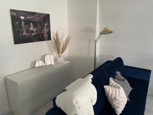 Ένα ή περισσότερα κρεβάτια σε δωμάτιο στο Luxus Apartment am Fremersberg - zentral - mit Sauna & Badewanne