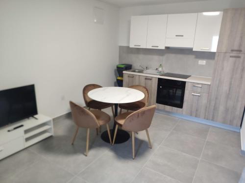 Η κουζίνα ή μικρή κουζίνα στο Apartmani Petra
