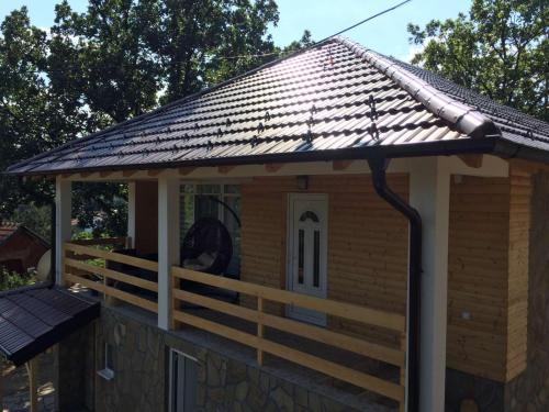 a dog house with a pitched roof at Stari Hrast 2 in Prolomska Banja