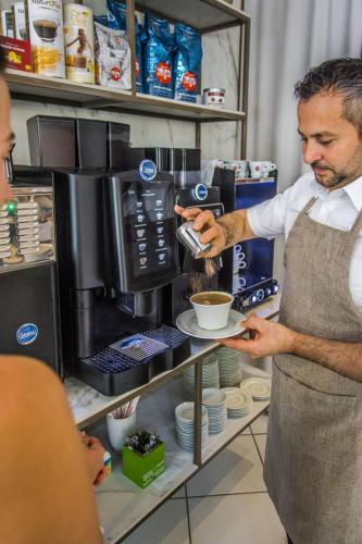 Hotel Excelsiorにあるコーヒーまたはお茶