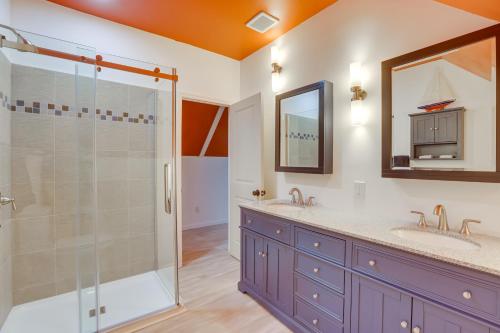 a bathroom with two sinks and a shower at Pet-Friendly Cropwell Retreat on Coosa River! 