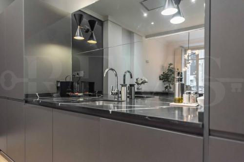 Contemporary loft in the historic city center by REMS photo 13