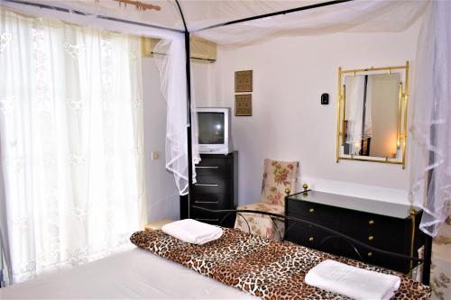 Ένα ή περισσότερα κρεβάτια σε δωμάτιο στο Eva Seaside 1st Floor