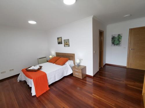 Un pat sau paturi într-o cameră la Apartamento Carrera