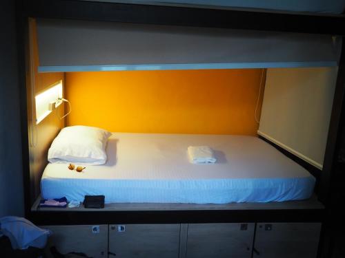 Postel nebo postele na pokoji v ubytování Baboon Hostel