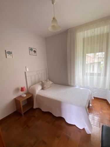 Posteľ alebo postele v izbe v ubytovaní Casa A Illa de Arousa
