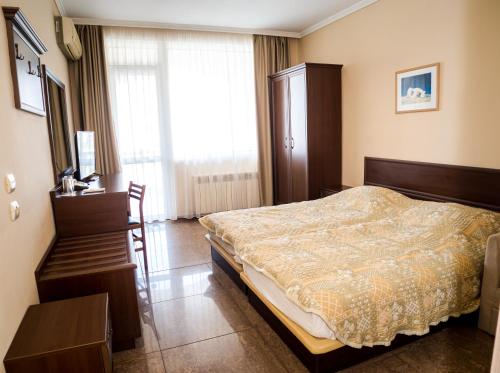 Ένα ή περισσότερα κρεβάτια σε δωμάτιο στο Villa Aurora