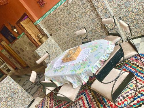 an overhead view of a room with a table and chairs at Atlas Imsker in Marrakesh