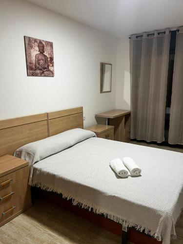 Кровать или кровати в номере Central Apartment