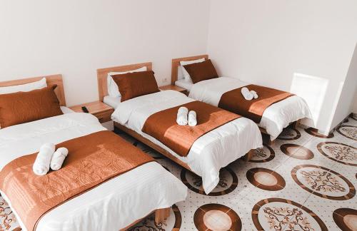 Ένα ή περισσότερα κρεβάτια σε δωμάτιο στο Villa Lindi