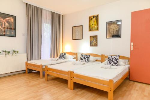 Ένα ή περισσότερα κρεβάτια σε δωμάτιο στο Villa Milovanovic