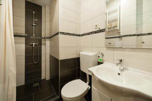 Ванна кімната в Budapest Holidays Apartments