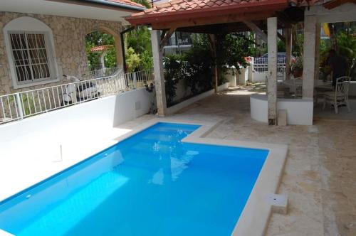 Bazén v ubytování Bayahibe, Dominicus Camere in villa con piscina nebo v jeho okolí