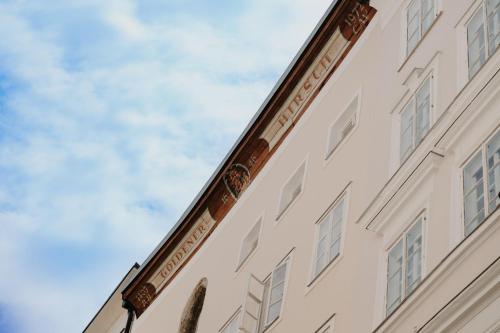 a close up of the side of a building at Hotel Goldener Hirsch, A Luxury Collection Hotel, Salzburg in Salzburg