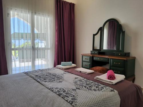 Кровать или кровати в номере Luxuriant Houses Kyrenia