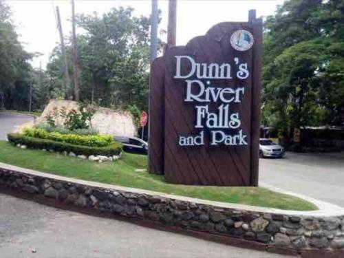 a sign for dums river falls and park at Osmax Oasis, 2 BD and 2 BA, Gated, near Puerto Seco Beach in Discovery Bay