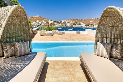 a view of a swimming pool from a resortvisorvisorvisorvisor at Santa Marina, A Luxury Collection Resort, Mykonos in Ornos