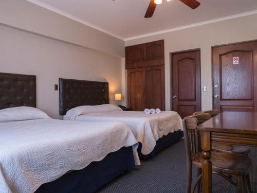 Postel nebo postele na pokoji v ubytování Hotel Econohotel