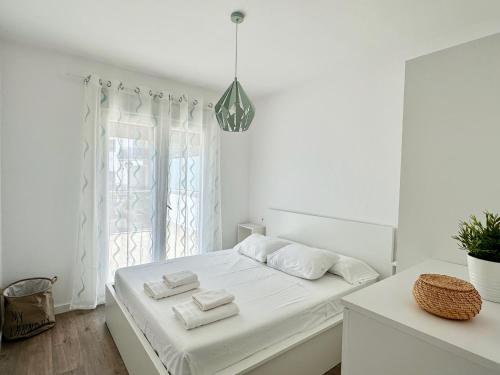 Llit o llits en una habitació de Apartamento Aguacate Beach Golf