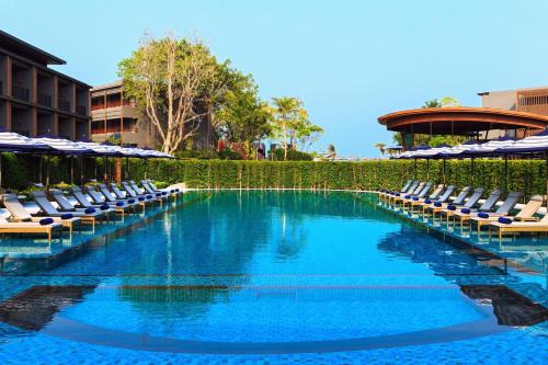 Bazén v ubytování Hua Hin Marriott Resort and Spa nebo v jeho okolí