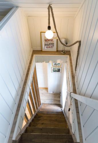 a staircase in a tiny house at The Buar Cabin in Strömstad