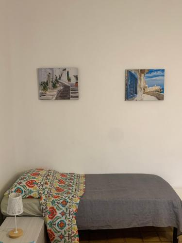 Ein Bett oder Betten in einem Zimmer der Unterkunft Nontiscordardimé Apt