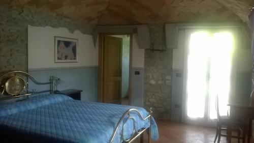 Posteľ alebo postele v izbe v ubytovaní Locanda di Campagna