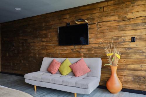 TV a/nebo společenská místnost v ubytování BluGlamp PlayaBlanca