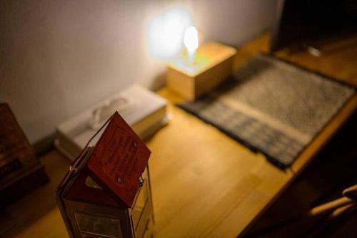 Postel nebo postele na pokoji v ubytování 日向サーフキャンプ206