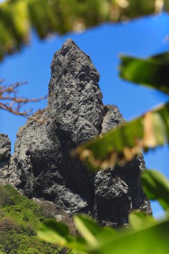 a large rock on top of a mountain at Dolphin Hotel in Fernando de Noronha