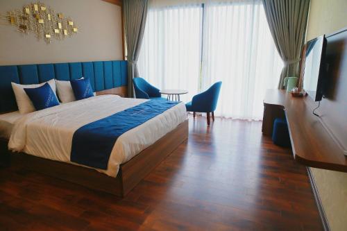 Thái Nguyên Legend Hill tesisinde bir odada yatak veya yataklar