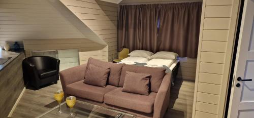 Tempat tidur dalam kamar di Villa Oleanna