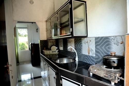 Thabi's Home tesisinde mutfak veya mini mutfak