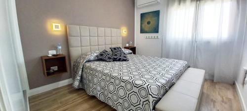 Postel nebo postele na pokoji v ubytování Ca Cristina Puerto Rico