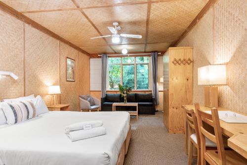 Ένα ή περισσότερα κρεβάτια σε δωμάτιο στο Tallow Beach Motel