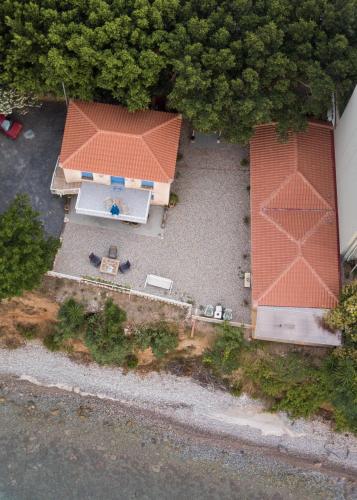 an aerial view of a house with a roof at Rocksecret Edge in Kalamata