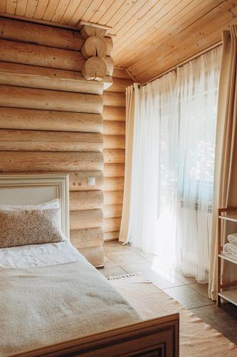 Postel nebo postele na pokoji v ubytování KLEN Family